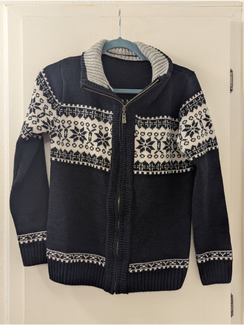 Nordic-Inspired Navy Sweater With Full Zip & White Snowflake Pattern